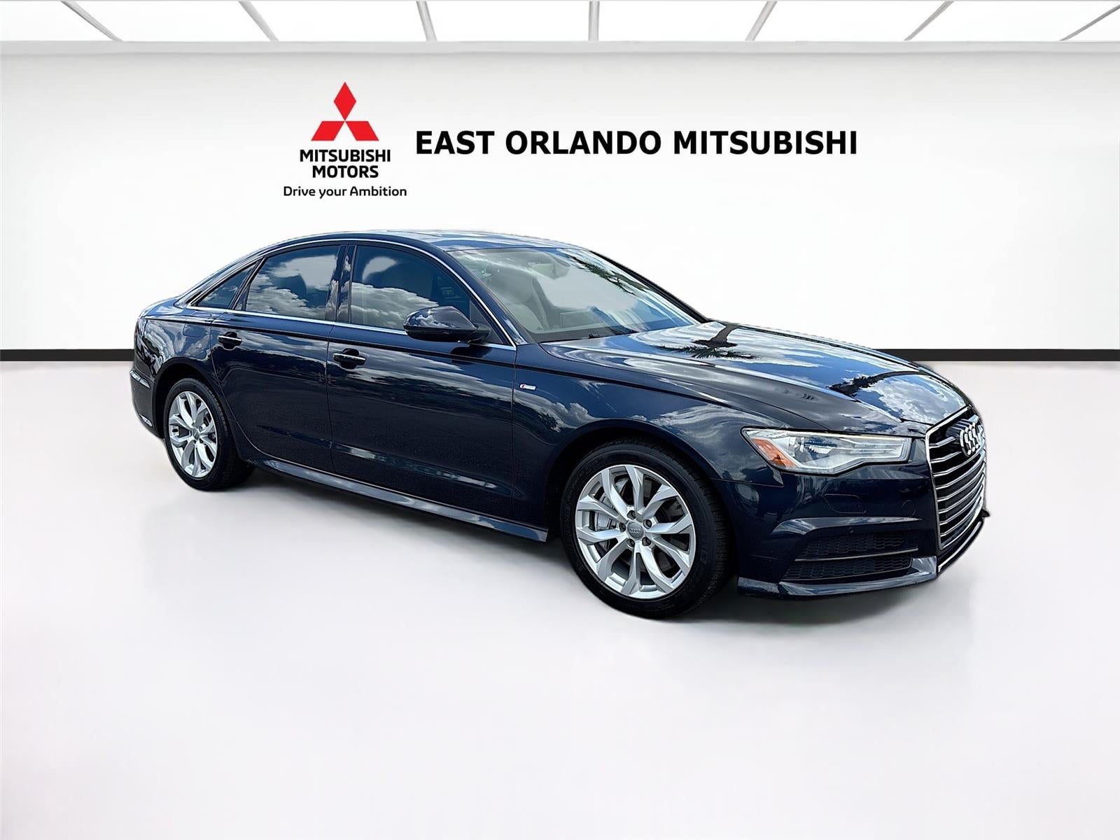2018 Audi A6 Premium in Moonlight Blue Metallic — front three-quarter view